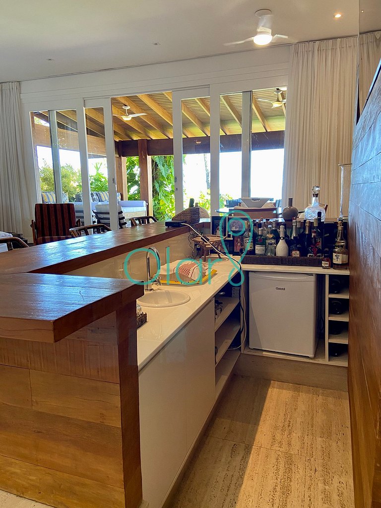 Casa em condomínio com 5 suítes, pé-na-areia, em Juquehy