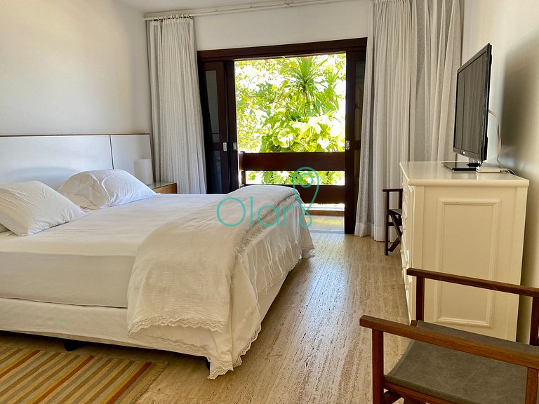 Casa em condomínio com 5 suítes, pé-na-areia, em Juquehy