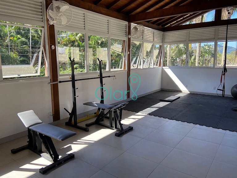 Casa de condomínio com 4 suítes à beira mar com vista panorâ