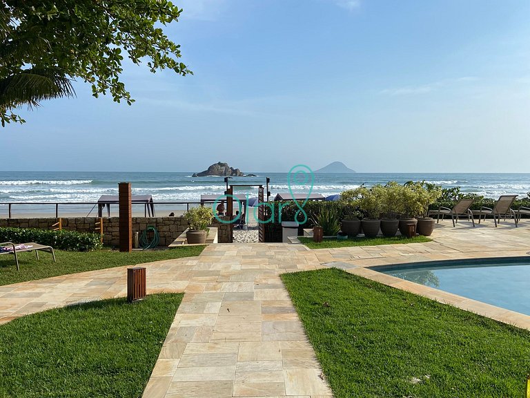 Casa de condomínio com 4 suítes à beira mar com vista panorâ