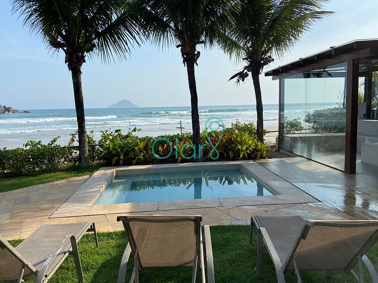 Casa de condomínio com 4 suítes à beira mar com vista panorâ