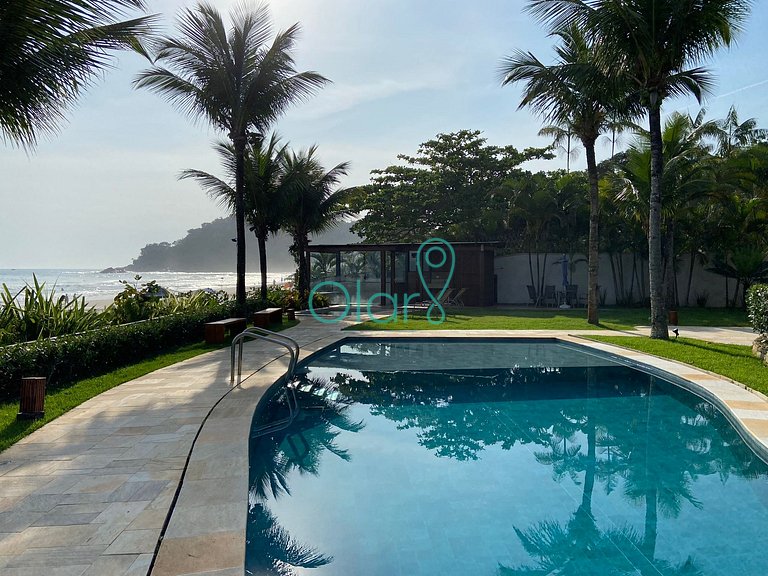 Casa de condomínio com 4 suítes à beira mar com vista panorâ