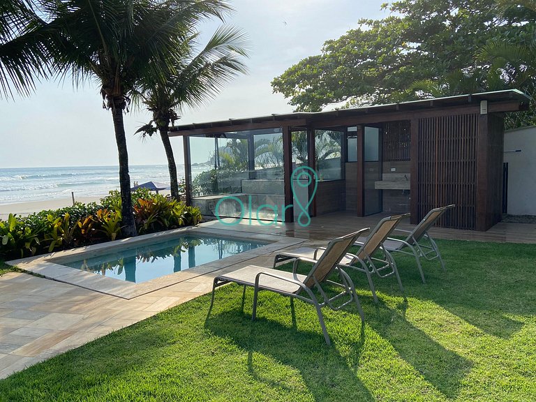 Casa de condomínio com 4 suítes à beira mar com vista panorâ