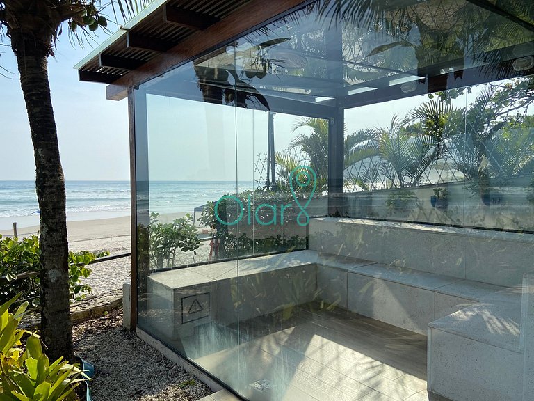 Casa de condomínio com 4 suítes à beira mar com vista panorâ