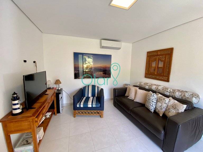 Casa de condomínio com 4 suítes à beira mar com vista panorâ